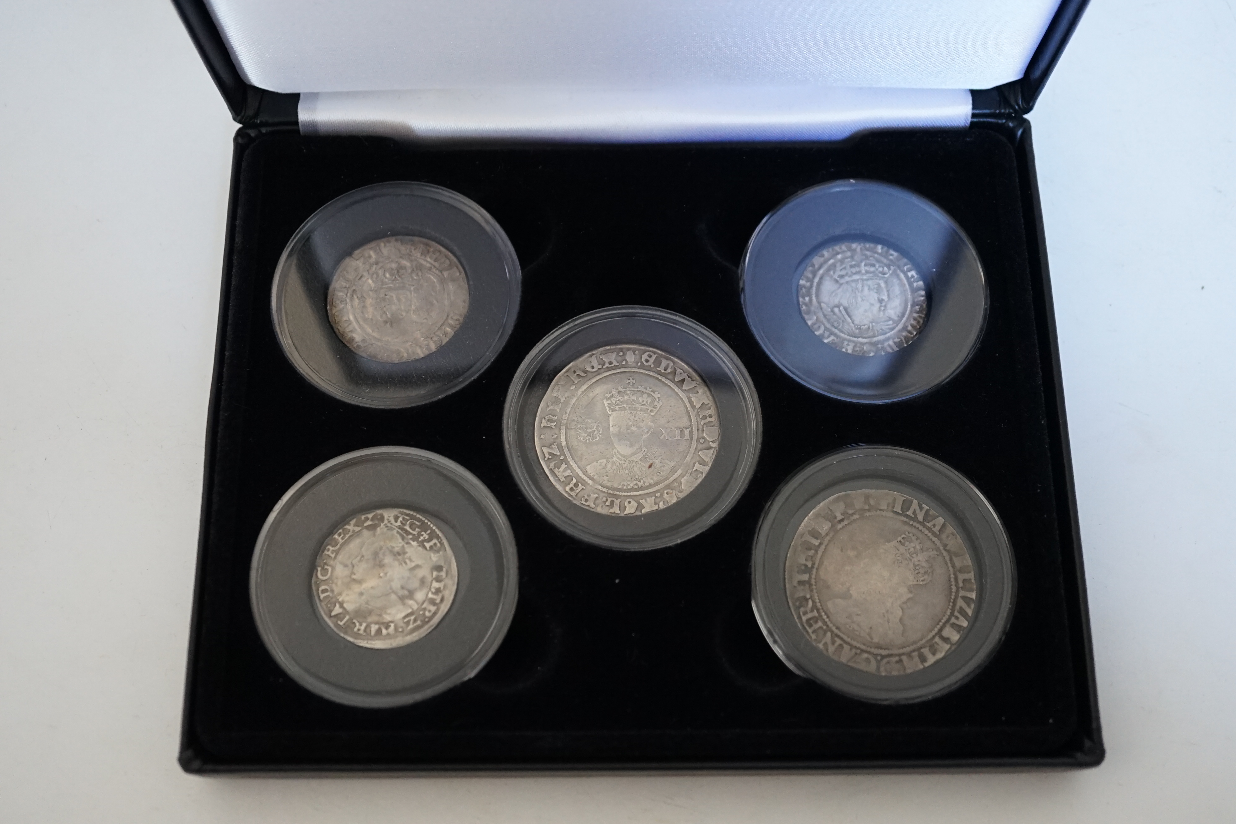 British ‘Tudor dynasty’ hammered silver coin collection; a Henry VII silver groat, (probably S2200), mm. cross-crosslet, edge split at 10 o’clock otherwise near VF, a Henry VIII silver groat, (S2337E), mm. rose, flange o
